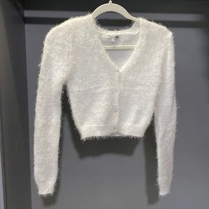 white v-neck fuzzy sweater